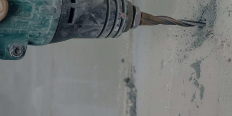 Drilling a Hole Into The Concrete Wall